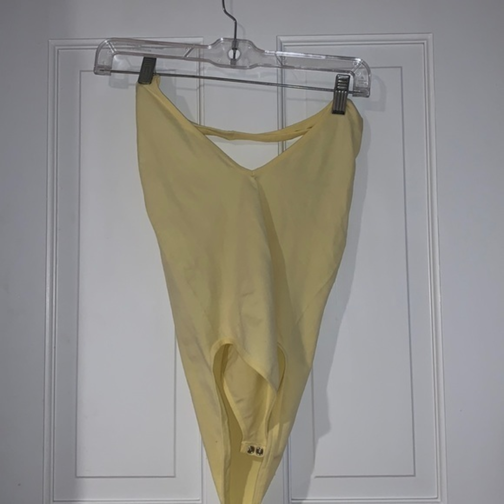 Forever 21 yellow halter body suit low cut back
